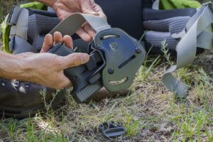 Locking waist slide holsters and hiking