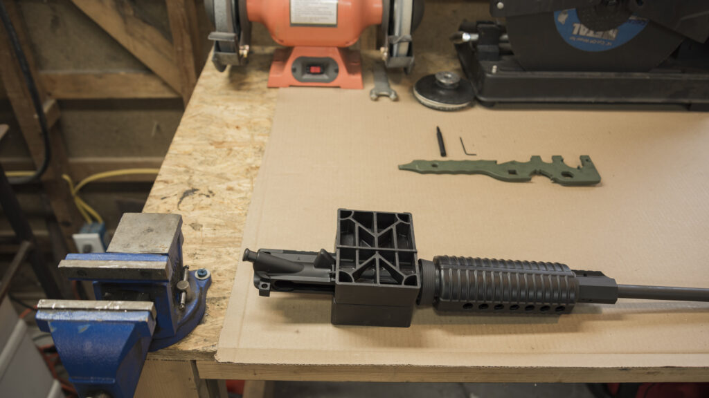 Placing the AR-15 barrel into a vice block
