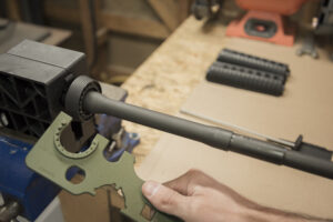 Using the armorer's tool to remove an AR-15 barrel