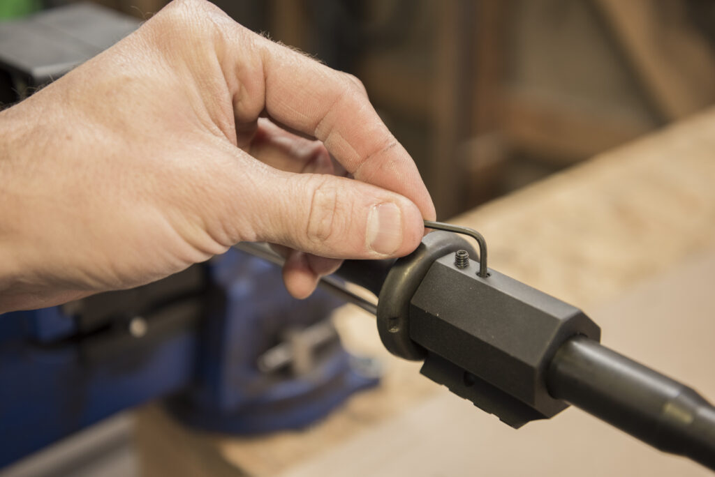 Tightening screws to install the gas block