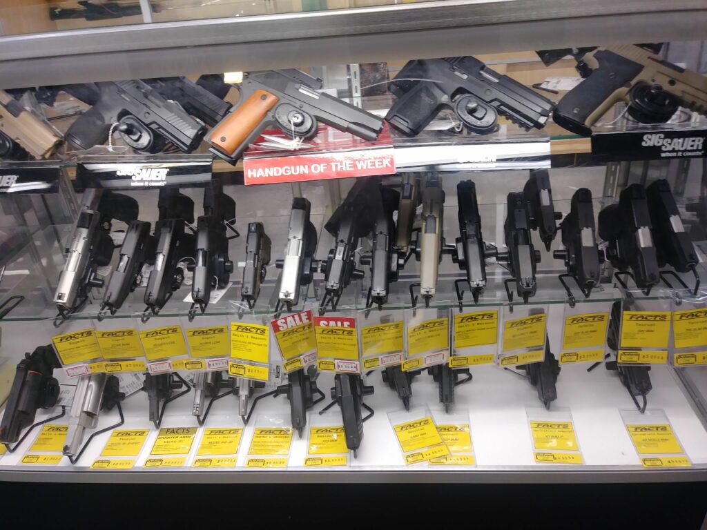 handguns displayed at a gun shop