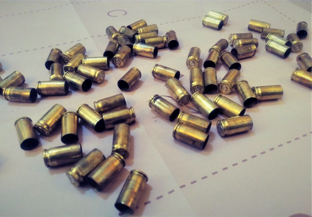 Empty ammo casings on a target
