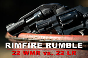 22 war vs 22 lr pistols on a table at the range