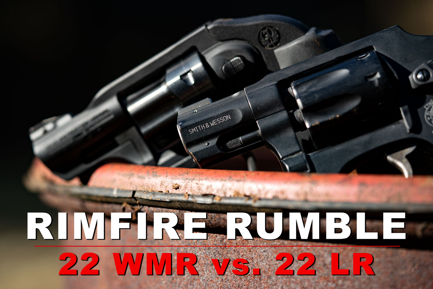 22 war vs 22 lr pistols on a table at the range