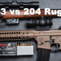 223 vs 204 Ruger rifles and ammo on display