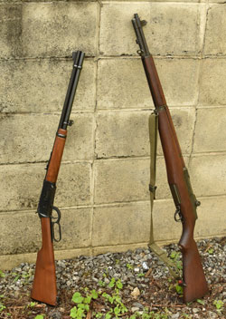 30-06 vs. 30-30 rifles leaning against a wall
