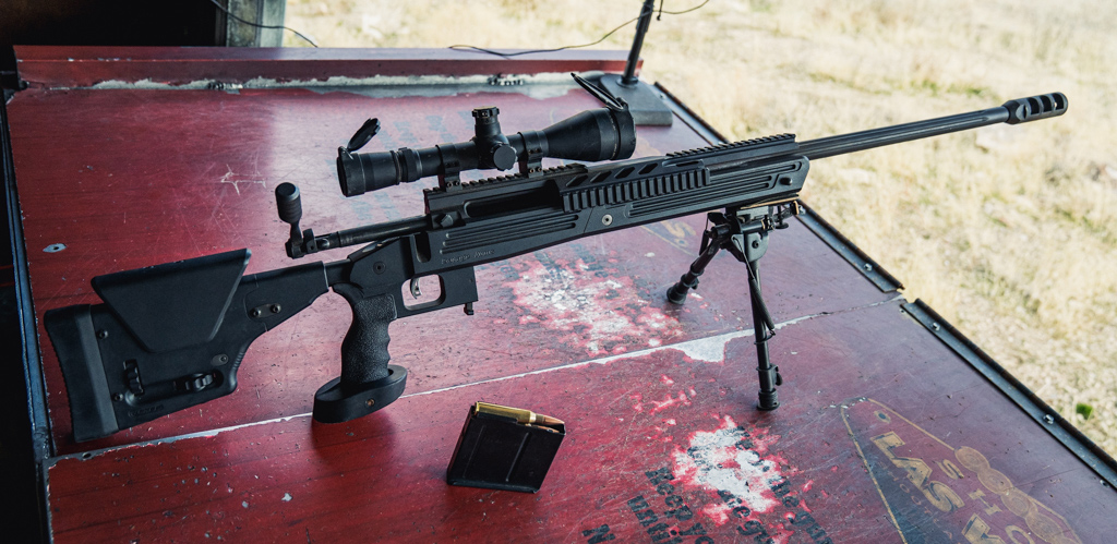 338 lapua magnum rifle and ammo A 338 lapua magnum rifle on a shooting rest