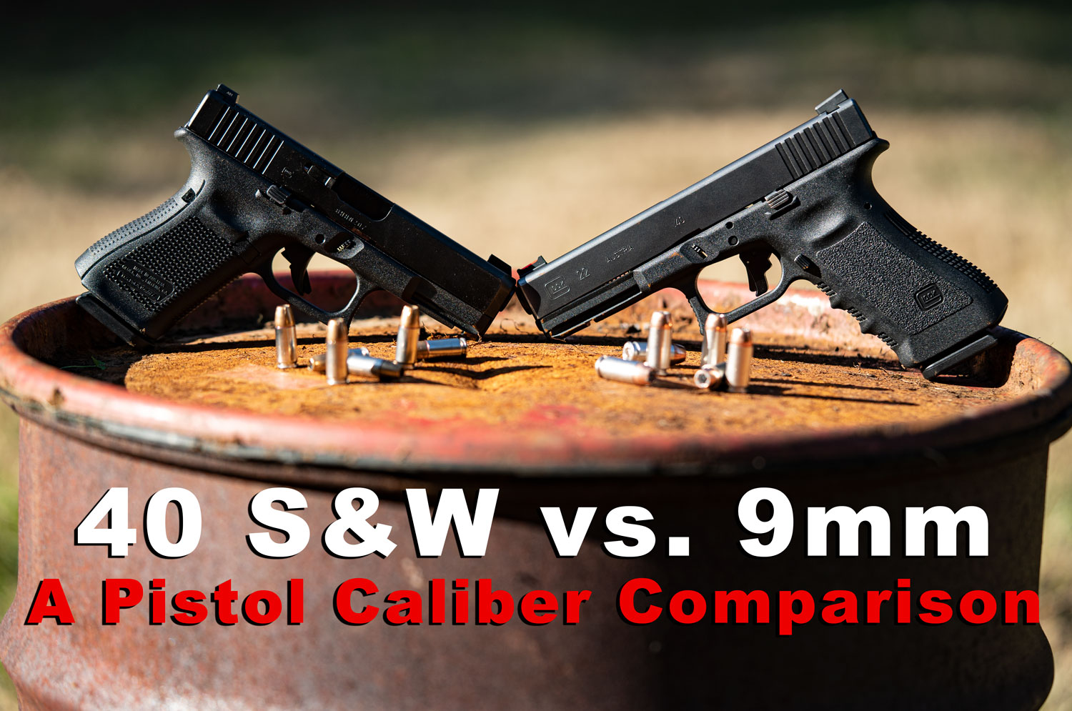 40 S&W and 9mm pistols on a barrel top