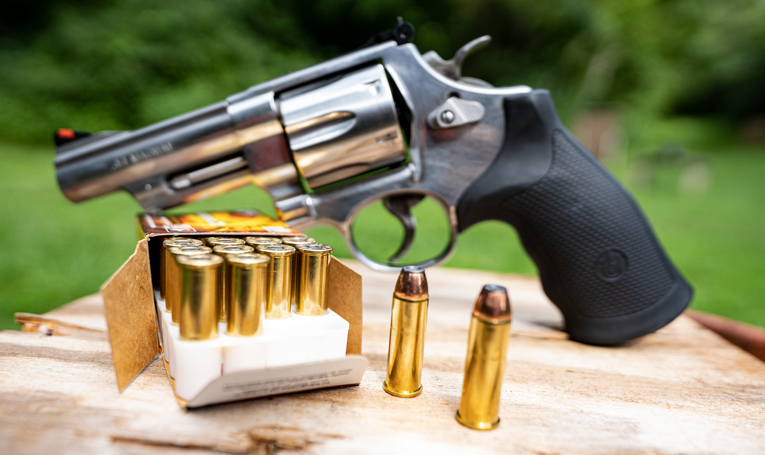 44 magnum revolver with ammunition at a shooting range