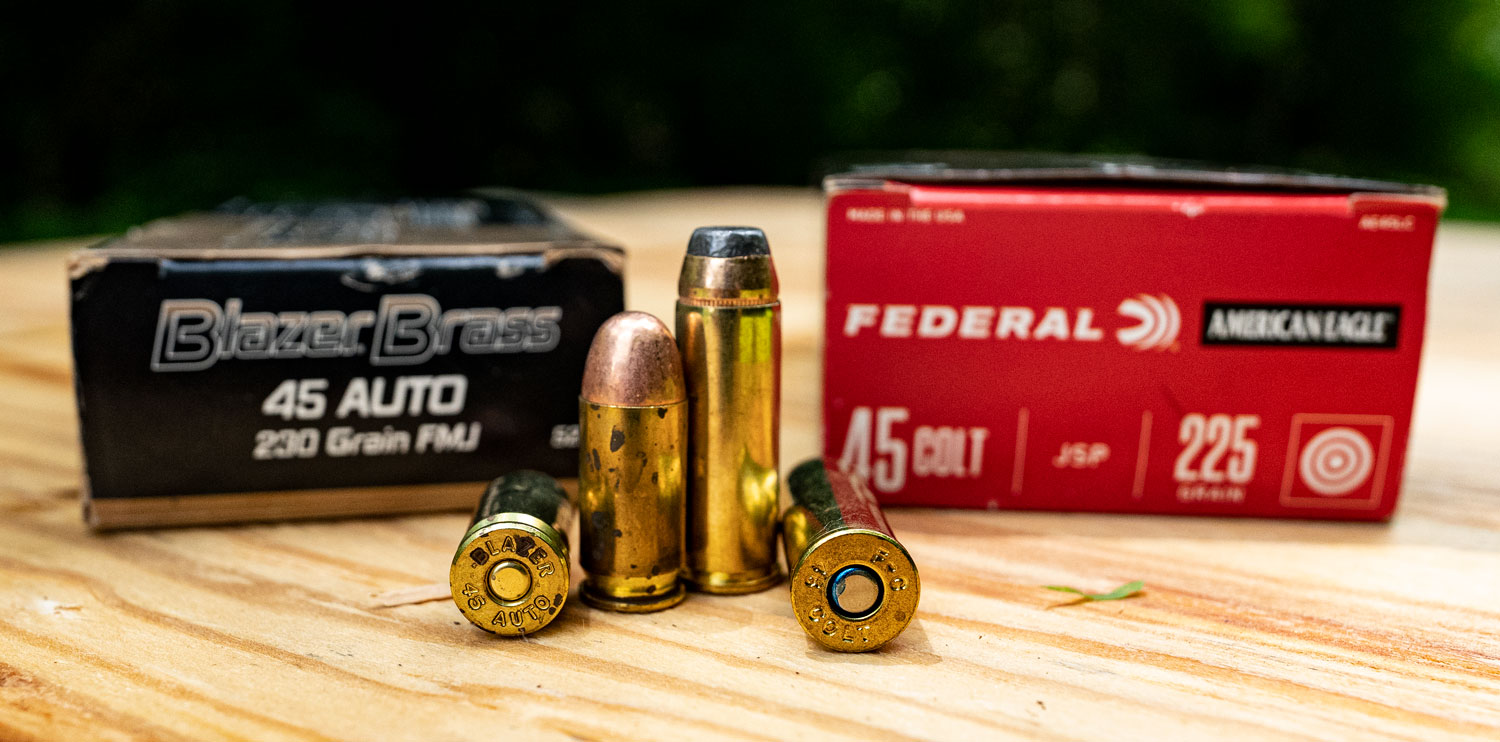 45 long colt vs 45 ACP ammo side by side