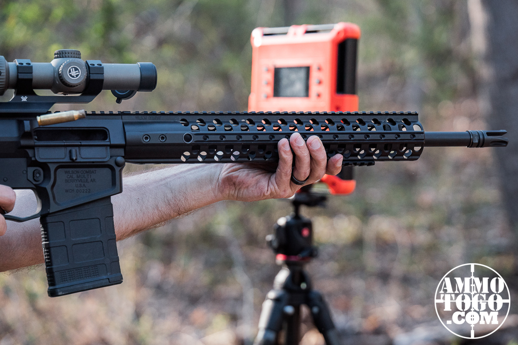 .308 with chronograph Firing a .308 Winchester rifle with a chronograph at an outdoor shooting range
