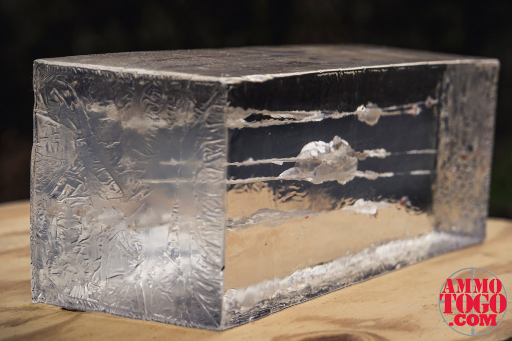 Muzzle Velocity measured with a chronograph and ballistic gel photo of a ballistic gel block on a sheet of plywood