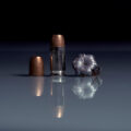 photo of .380 acp ammo with reflection