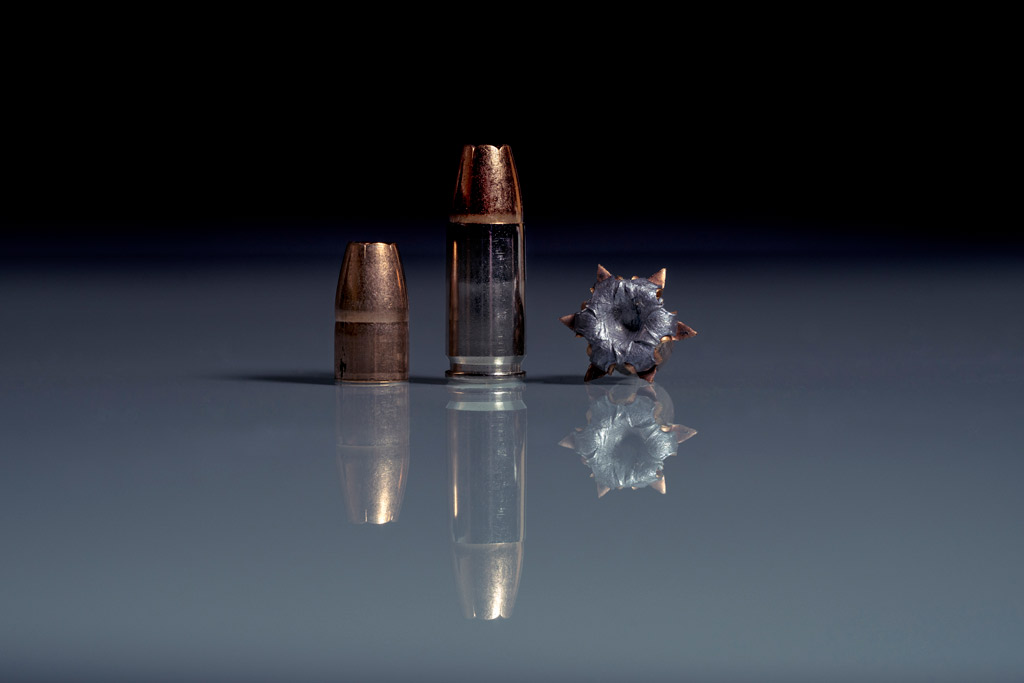 photo of 9mm ammo with reflection