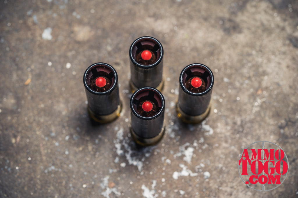 sabot slugs 12 gauge shotgun ammo for hunting photo of sabot slug shotgun ammo on a concrete floor