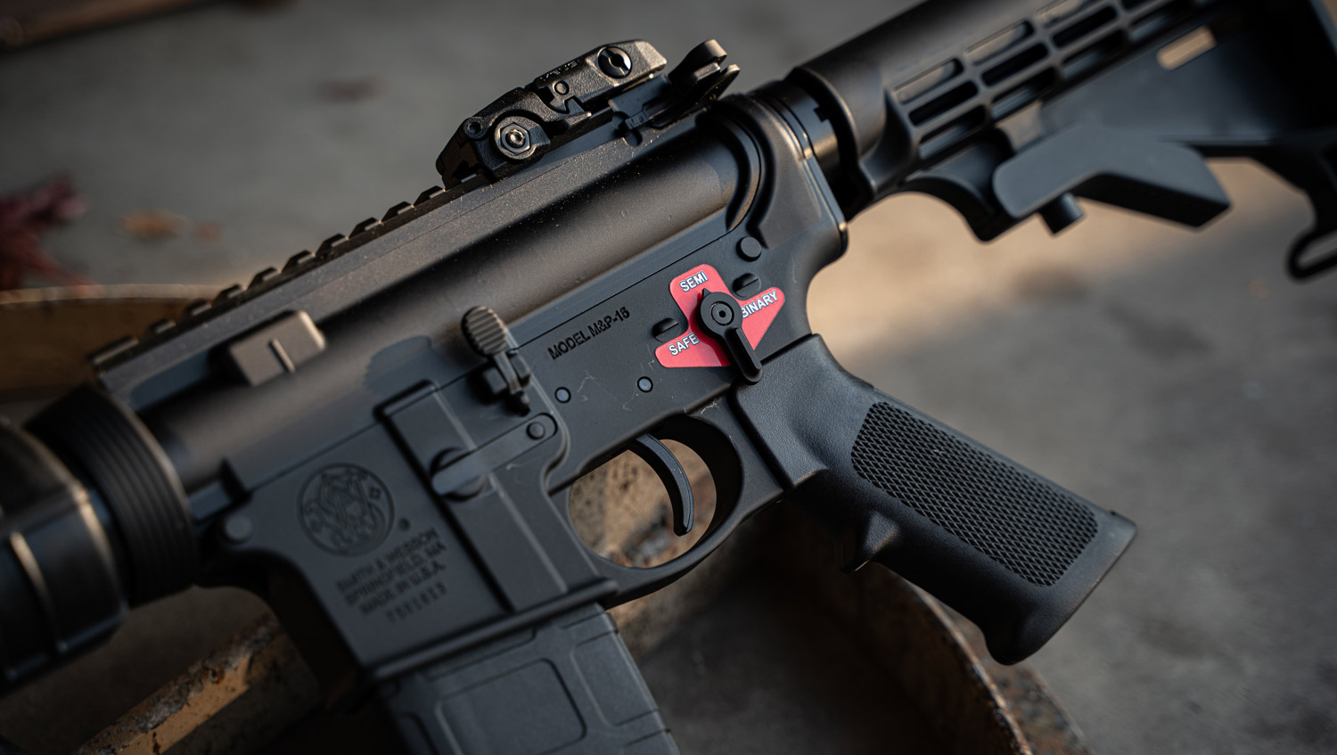 A close up of the trigger switch for a binary trigger