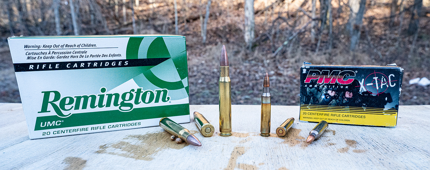 30-06 ammo box next to 5.56x45 ammo box