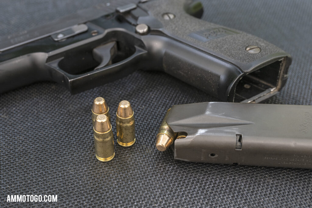 357 Sig ammo in a pistol Sig P226 handgun and magazine loaded with 357sig ammunition