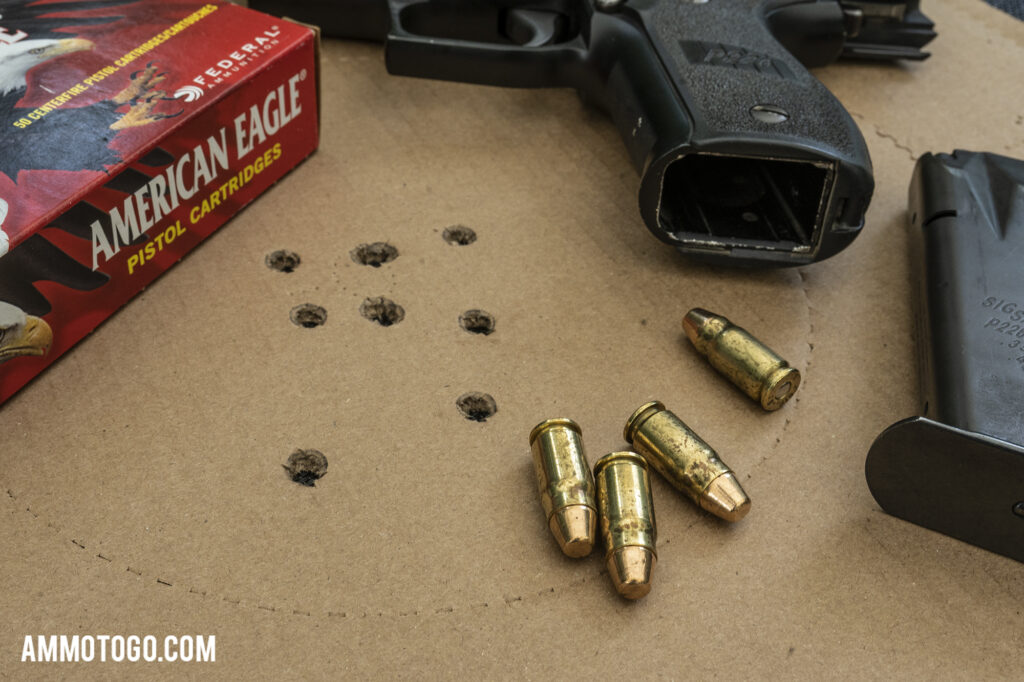 Sig P226 hangun with 357sig ammunition and shooting taget