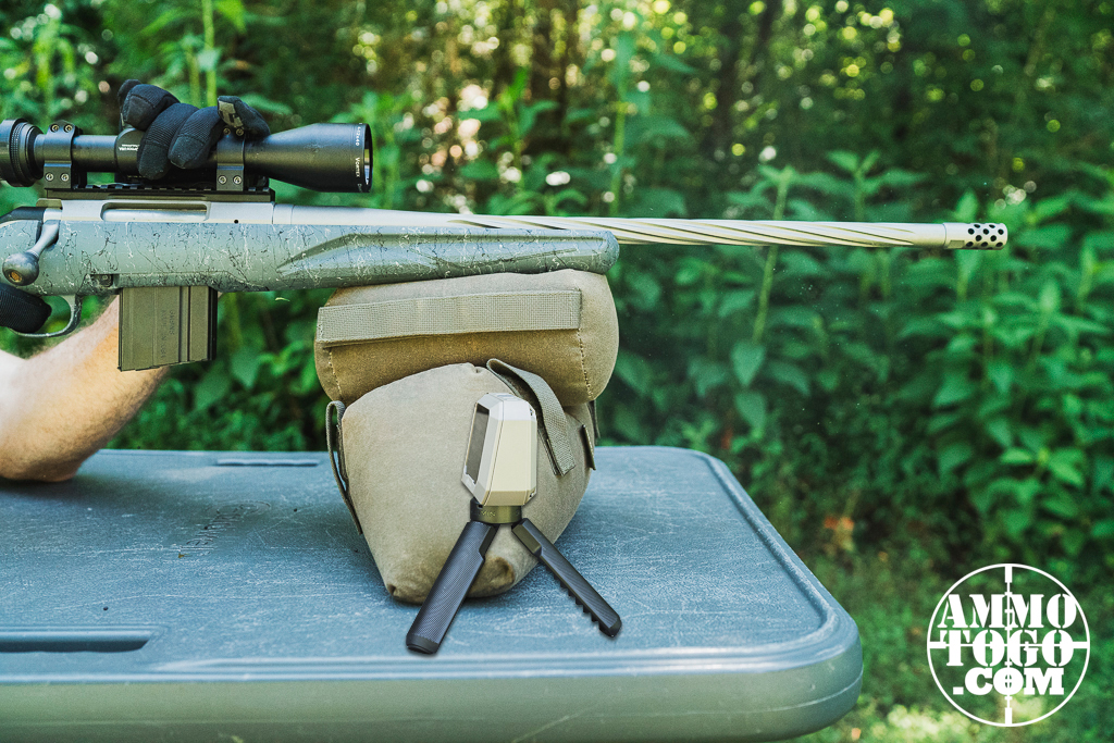 The author shooting a 22 ARC rifle at the shooting range to test bullet velocity