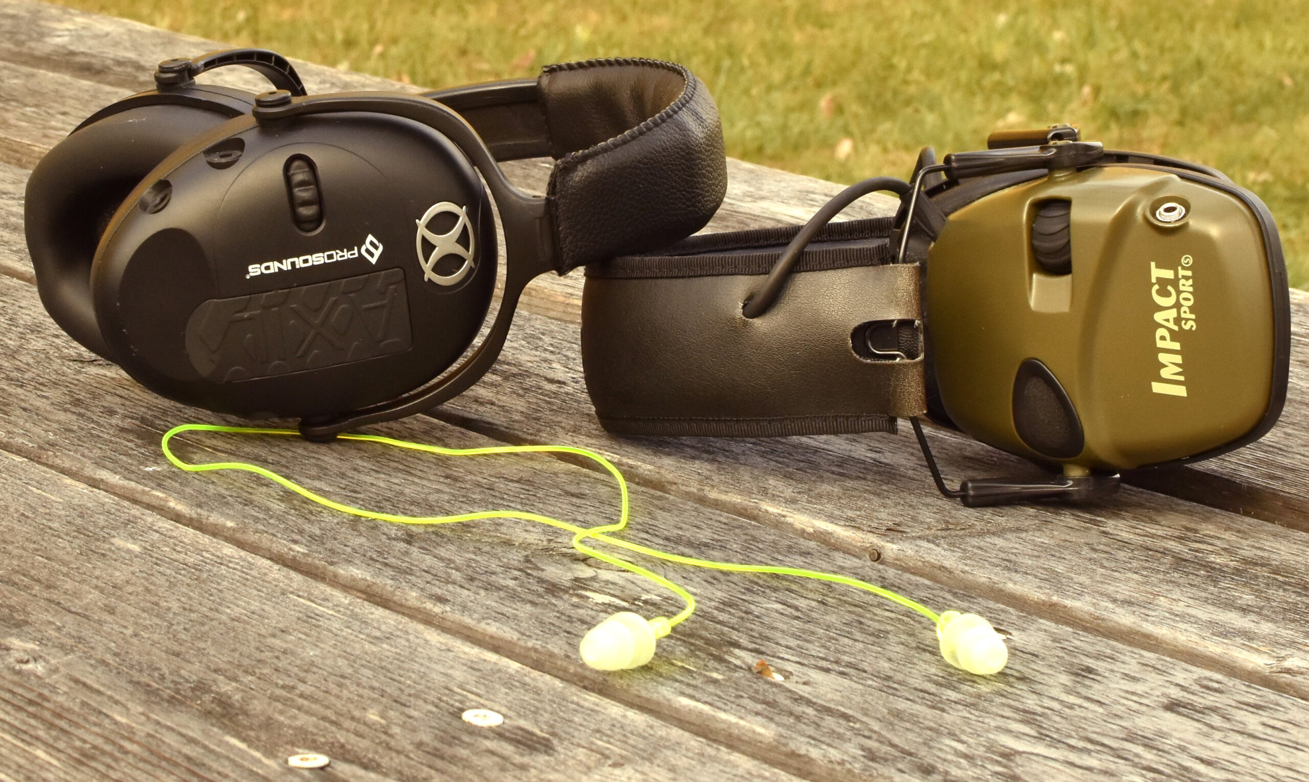 ear protection muffs and plugs on a table