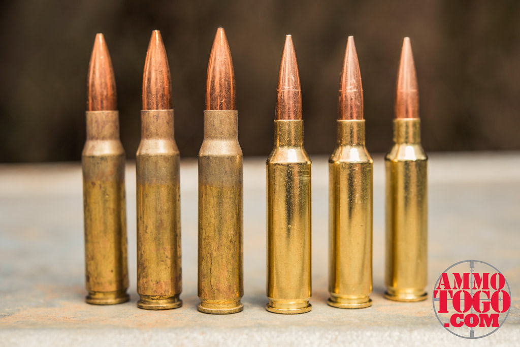 photo of Federal .308 ammunition next to Federal 6.5 Creedmoor ammunition outdoors