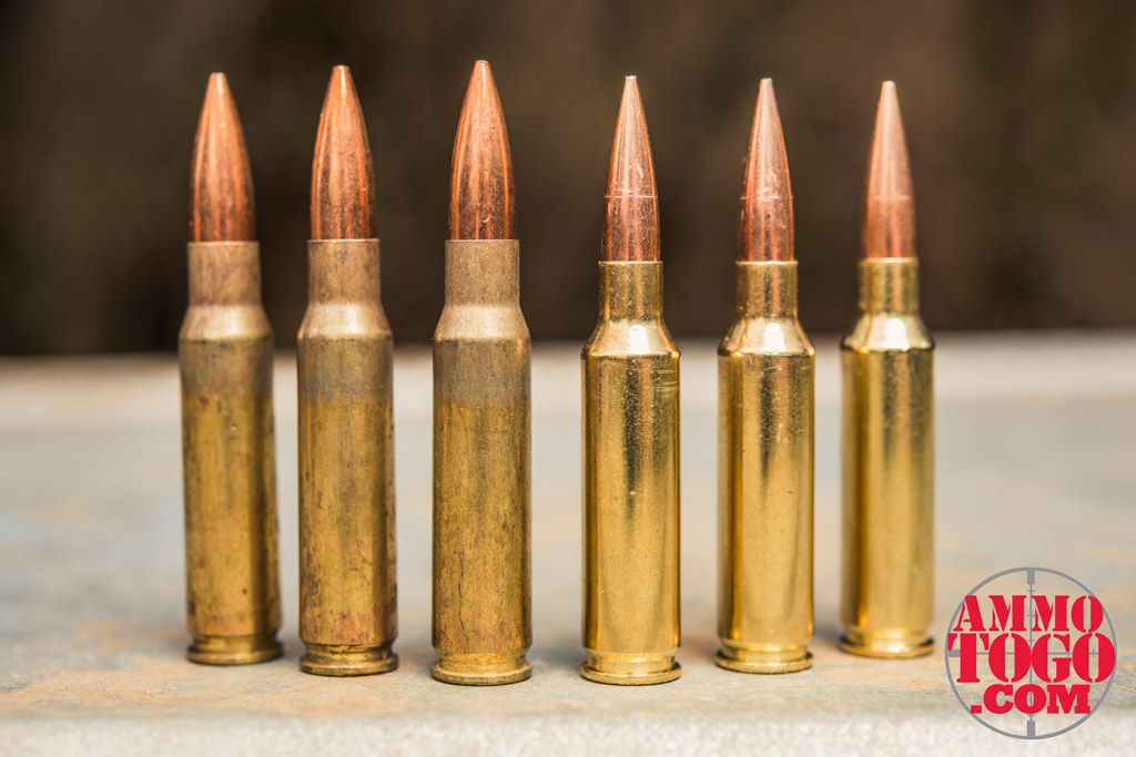 Federal .308 ammunition compared to Federal 6.5 Creedmoor ammunition photo of Federal .308 ammunition next to Federal 6.5 Creedmoor ammunition outdoors