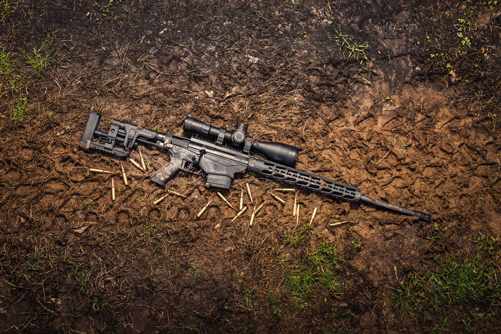 photo of the ruger precision rifle chambered in 6.5 creedmoor outside in the mud