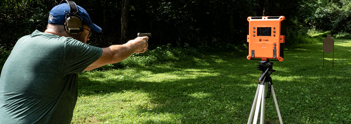 Testing 32 ACP velocity at a shooting range by firing it in a pistol with a chronograph