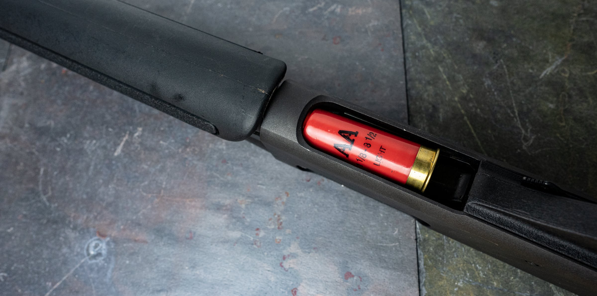 A shotgun with a tube magazine The tube magazine on a 12 gauge Remington shotgun