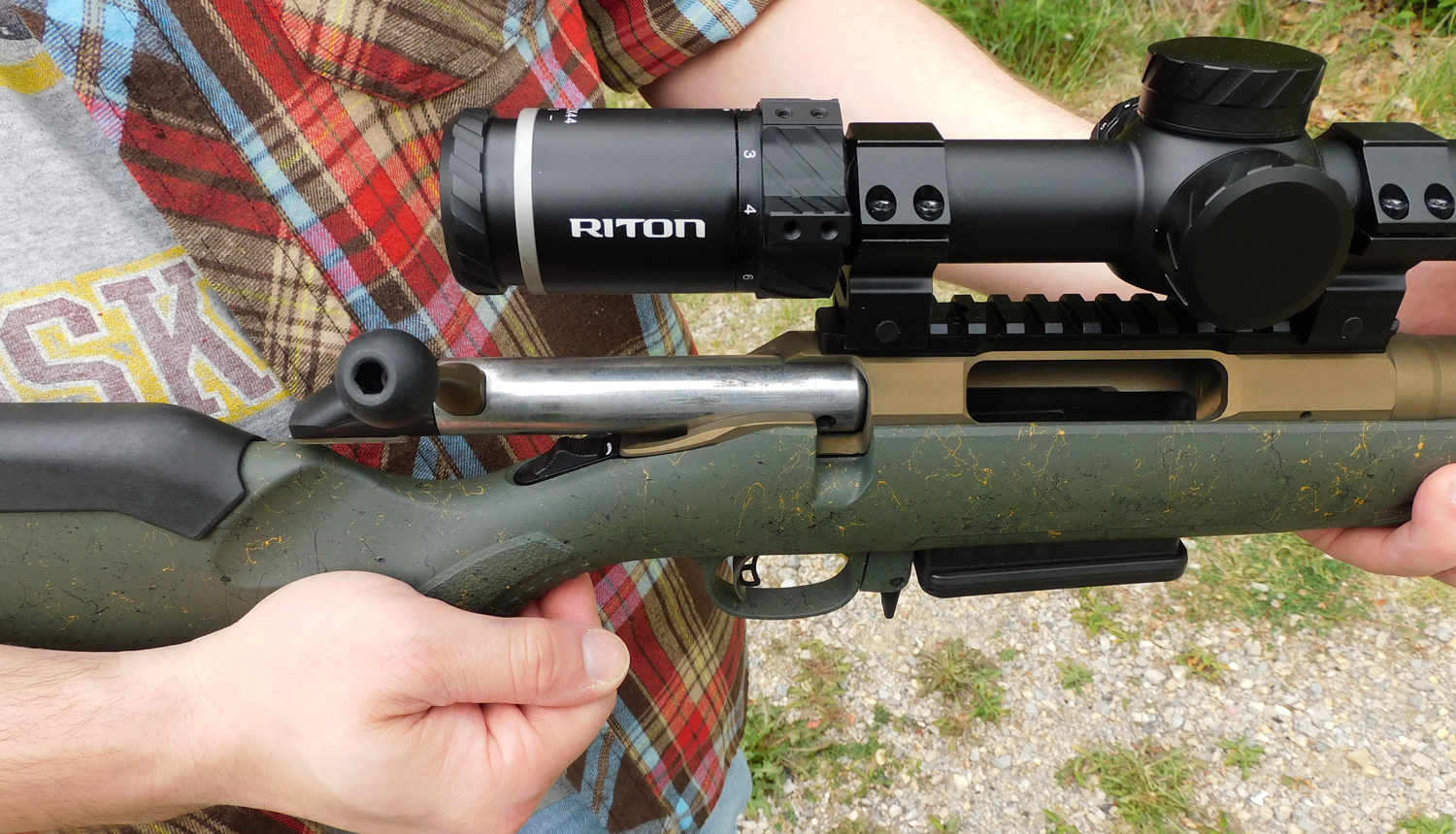 The author working the action on the Ruger American Gen II Predator.