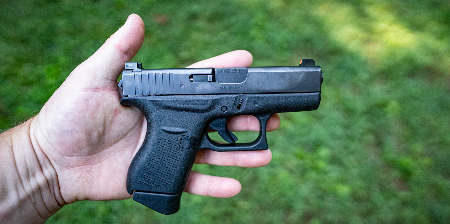 The Glock 42 held by a shooter in this photo is a popular concealed carry gun.