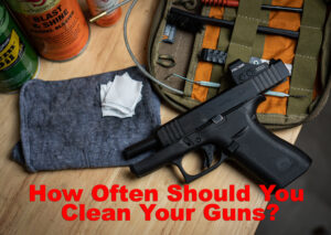 Gun oil and other firearm cleaning supplies with a pistol