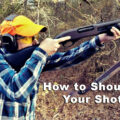 Demonstrating the correct way to shoulder a shotgun
