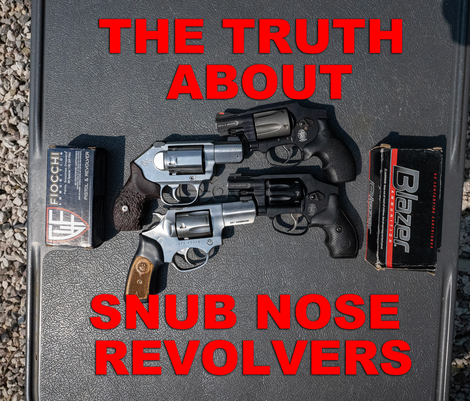 snub nose revolvers and ammo on a shooting bench