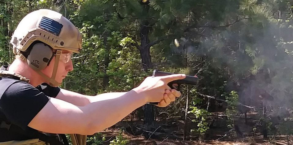 A shooter using the weaver stance with a pistol